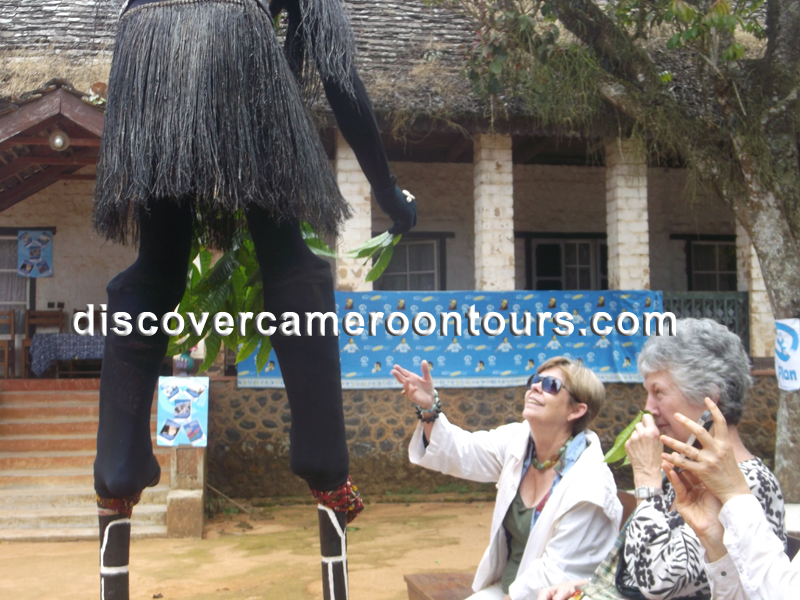 Juju stilt dancer performing a traditional dance